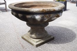 A composition garden urn of large proportions,
