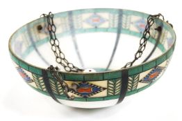 A large marbled glass light pendant shade, enamelled with polychrome Art Deco motifs,