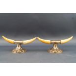 A pair of silver mounted mini ivory tusk knife rests, Birmingham 1911,