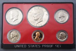 A 1973 American cents and dollar coin set, proof sealed with fitted case.