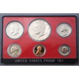 A 1973 American cents and dollar coin set, proof sealed with fitted case.