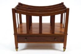 A Victorian mahogany canterbury of traditional rectangular form with dipped top