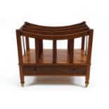 A Victorian mahogany canterbury of traditional rectangular form with dipped top