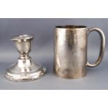 A plain silver cylindrical tapered mug, London 1920, 9cm high, 172 grams,