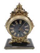 A French mantel clock, the 15cm dial with Roman numerals,