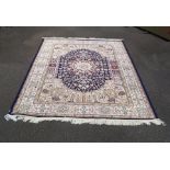 A blue ground Kohan rug,