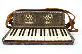 A Frontaline accordion, in blue mother of pearl effect finish, marked made in Italy 856,