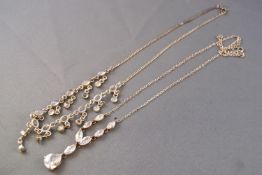 A white metal centrepiece fringe necklace set with cabochon moonstones,