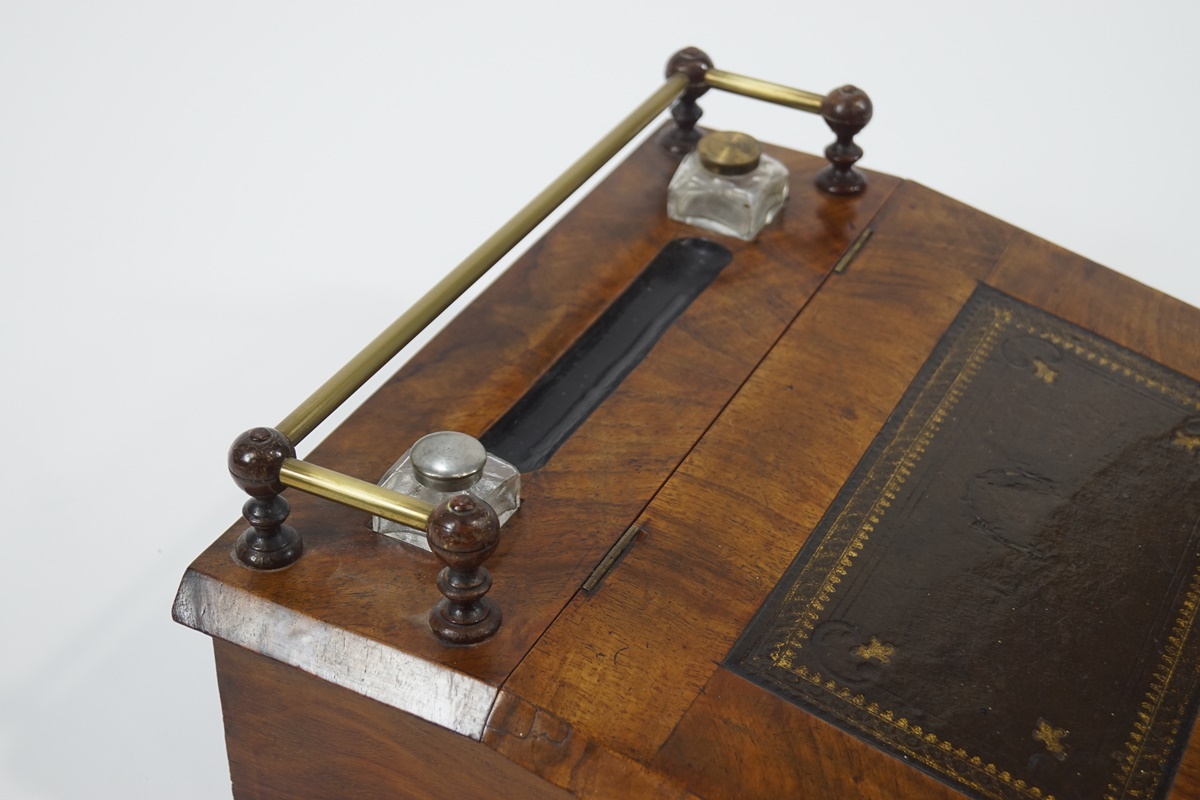 A walnut desk top writing slope with inset embossed leather surface and two ink bottles, - Image 3 of 3