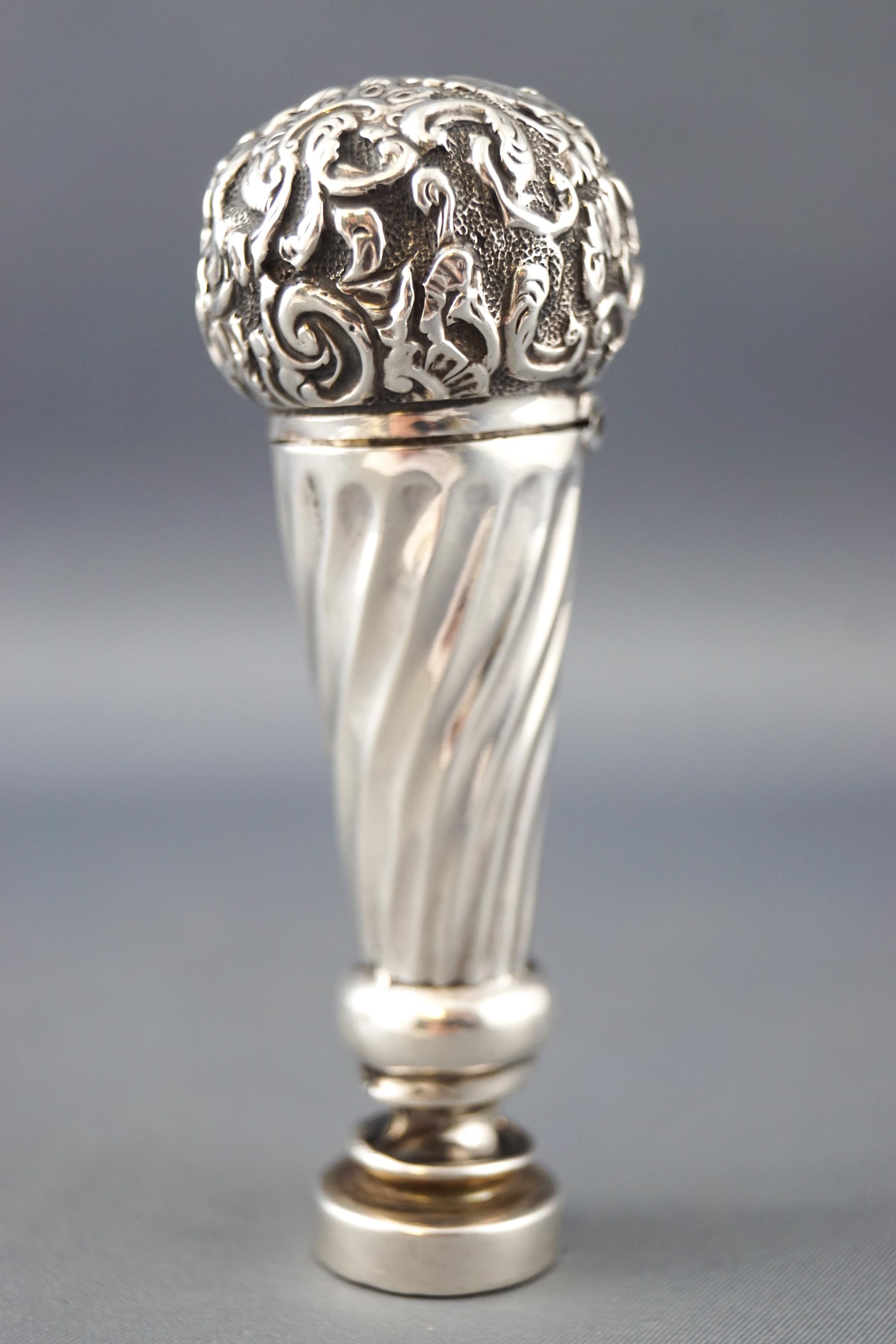 A parasol handle style silver desk seal with plain round matrix engraved a name,