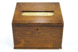 An oak hall letter box with brass label (24cm x 21cm x 16cm)