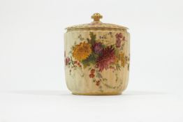 A Royal Worcester blush ivory biscuit barrel and cover, decorated with flower sprays,