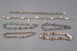 A collection of six silver bracelets of variable designs.