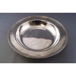 A plain round form silver Armada dish style bowl with applied and decorated rim, Sheffield 1935,
