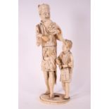 A late 19th century Japanese ivory sectional figure of two figures