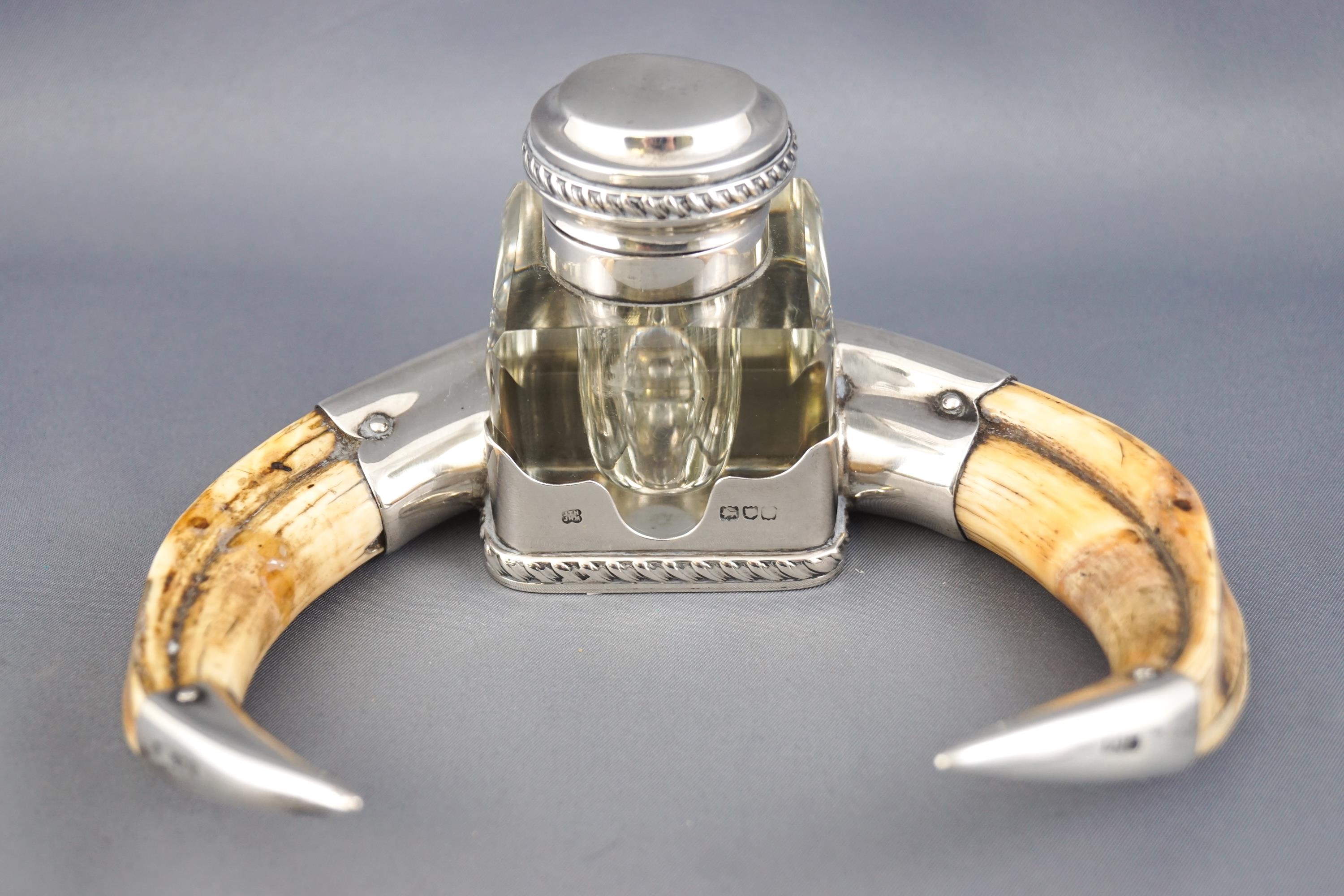 A silver mounted warthog (?) tusk desk standish set a cut glass lidded inkwell, London 1900,