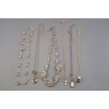 A collection of jewellery to include three silver necklaces,