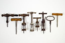 A collection of cork screws,