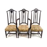 Six mahogany Hepplewhite style dining chairs including two carvers with long backs