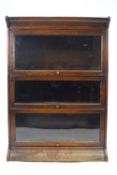 An oak Globe Wernicke style three section stacking bookcase,