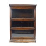 An oak Globe Wernicke style three section stacking bookcase,