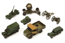 A group of eight Dinky army toys to include field guns and a search light