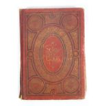 A 19th century red cloth bound black and gilt stamped Scrapbook,