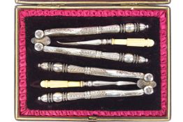 A 19th century cased set of two silver plated adjustable nutcrackers,