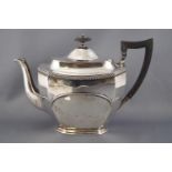 A silver three piece tea service of cut cornered rectangular form with plain domed lid