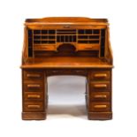 An early 20th century oak roll top Derby desk,