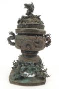 A Japanese bronze censor on a stand decorated with prunus blossom,