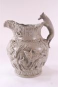 A Minton No 17 high relief hunting jug in drab green, decorated with scenes of foxes and hounds,