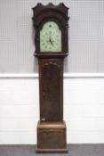 An 18th century mahogany long cased clock with enamel painted dial, decorated with a classical urn,