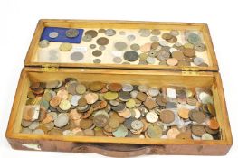 A mahogany box containing mixed coinage, of various dates and nationalities,