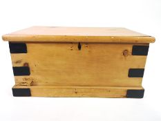 A small pine blanket box with metal drop handles and metal strap re-inforcements,