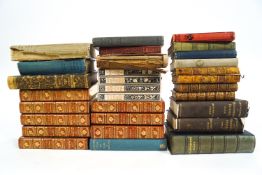 A quantity of books relating to Eton and other decorative bindings
