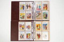 Two Stanley Gibbons postcard albums,