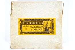 A boxed vintage Harrods de luxe Cabinet of Magic game with original contents