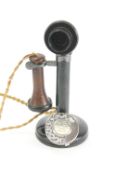 A candlestick telephone together with exchange box,