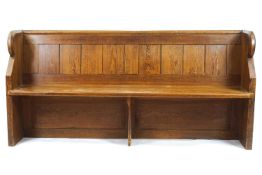 A Church pew and two ends, of plain form with planked back,
