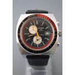 A stainless steel wristwatch by Sicura, having a black dial with chronograph feature and date,