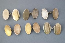 A selection of three pairs of chain link cufflinks.