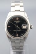 A stainless steel Rolex Oyster Perpetual date wristwatch.