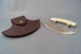 A demi-lune skinning knife, Canadian Inuit type,