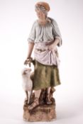 A Royal Dux female figure with a sheep, lifting up her apron to use to carry hay, applied pink pad,