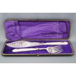 A cased plated set of fish servers with pierced and engraved blades on engine turned bead edge