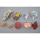 A collection of costume jewellery brooches of variable designs.