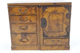 A Japanese hard wood Tansu, or Philosopher's travelling desk,