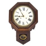 A mahogany cased Ansonia wall clock, made in Brooklyn,