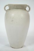 A Fulham saltglaze vase, of large baluster form with applied double strap round handles,